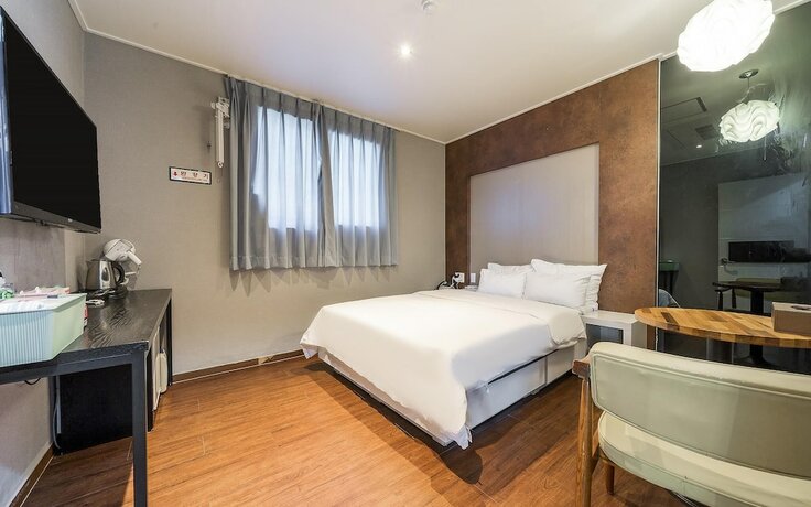 Imagen general del Hotel Jinju Seven. Foto 6