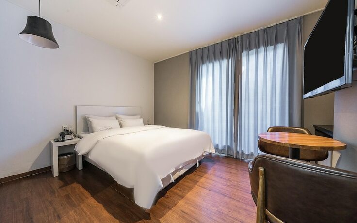 Imagen de la habitación del Hotel Jinju Seven. Foto 18