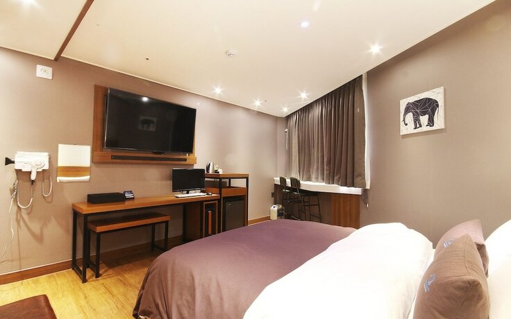 Imagen de la habitación del Hotel Jinju The Cloud. Foto 14