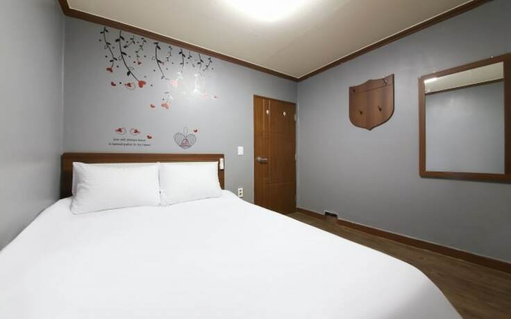 Imagen de la habitación del Hotel Jinju The First. Foto 16