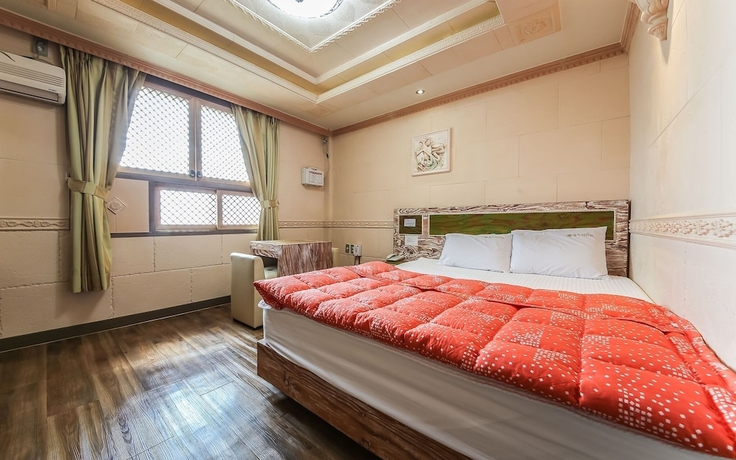 Imagen de la habitación del Hotel Jinju Tomji. Foto 11