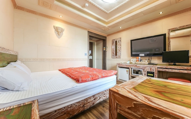 Imagen de la habitación del Hotel Jinju Tomji. Foto 14