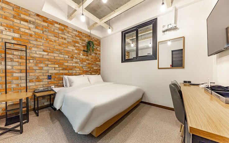 Imagen de la habitación del Hotel Jinju Vovo. Foto 15
