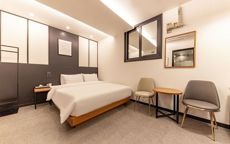 Imagen de la habitación del Hotel Jinju Vovo. Foto 16