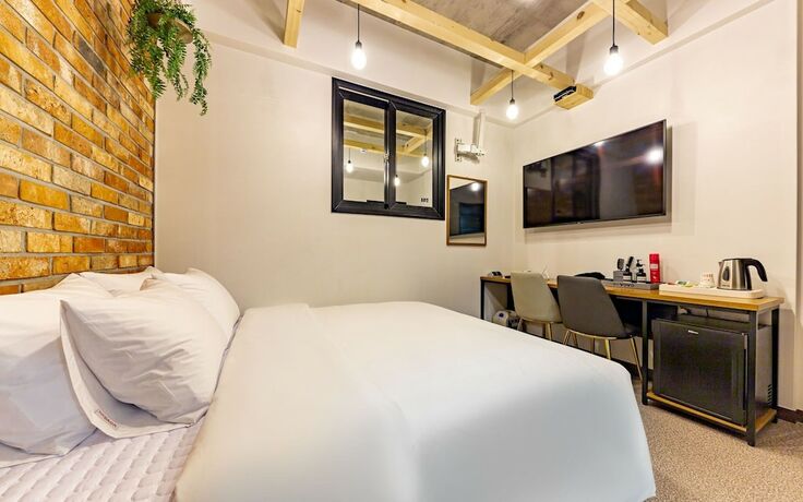 Imagen general del Hotel Jinju Vovo. Foto 9