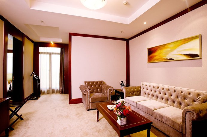 Imagen de la habitación del Hotel Jinling Cityview Zhenjiang. Foto 11