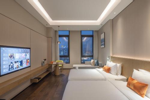 Imagen de la habitación del Hotel Jinling Collection Nanjing Jialong. Foto 18