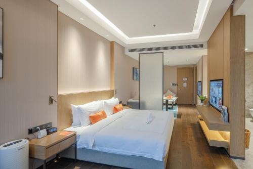 Imagen de la habitación del Hotel Jinling Collection Nanjing Jialong. Foto 20