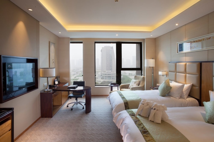 Imagen de la habitación del Hotel Jinling Grand Kunshan. Foto 4