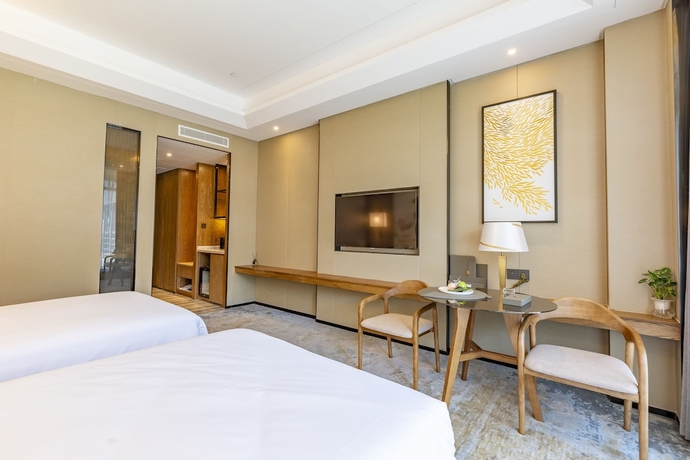 Imagen de la habitación del Hotel Jinling Grand Nanchang. Foto 14