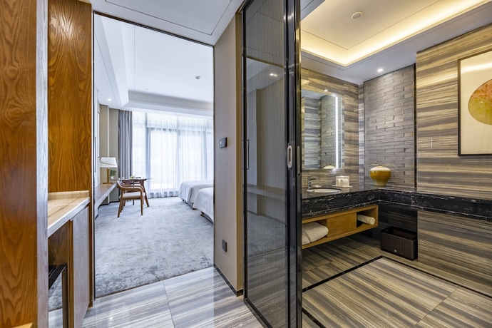 Imagen de la habitación del Hotel Jinling Grand Nanchang. Foto 15