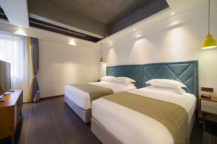 Imagen de la habitación del Hotel Jinling Landscape Beer Hot Spring. Foto 7