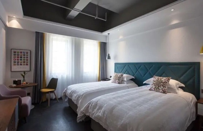 Imagen de la habitación del Hotel Jinling Landscape Beer Hot Spring. Foto 11