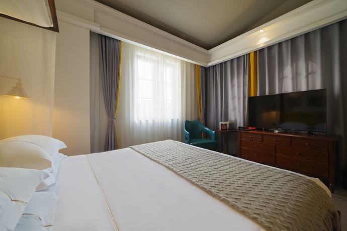 Imagen de la habitación del Hotel Jinling Landscape Beer Hot Spring. Foto 12