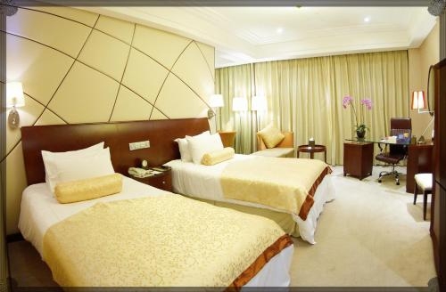Imagen de la habitación del Hotel Jinling Liyang Palace. Foto 5