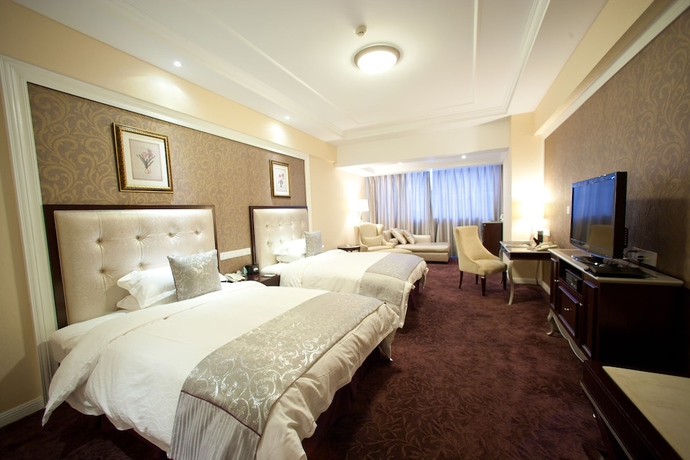 Imagen de la habitación del Hotel Jinling Mandarin Garden Nanjing. Foto 4
