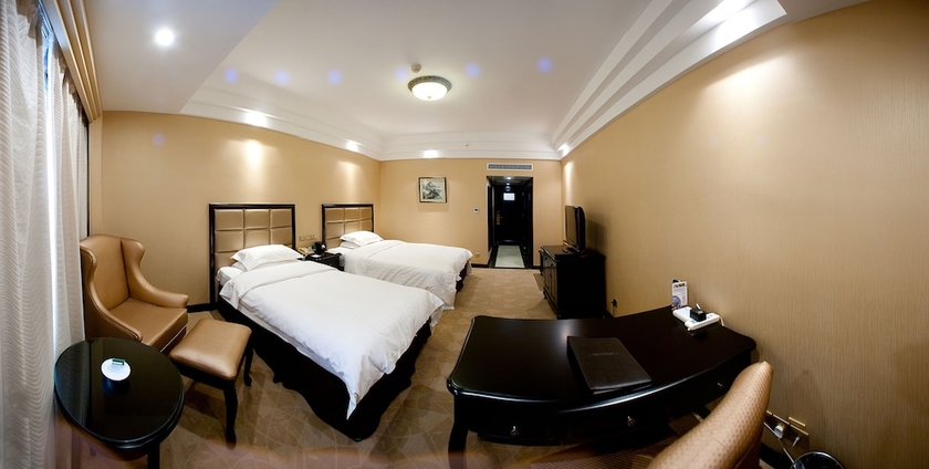 Imagen de la habitación del Hotel Jinling Mandarin Garden Nanjing. Foto 8
