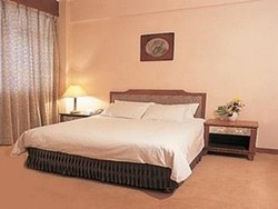 Imagen de la habitación del Hotel Jinling Mansion Nanjing. Foto 4