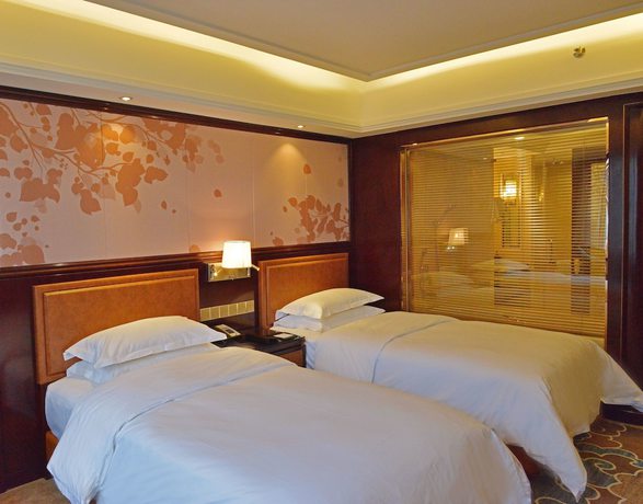 Imagen de la habitación del Hotel Jinling Mingdu Changzhou. Foto 13