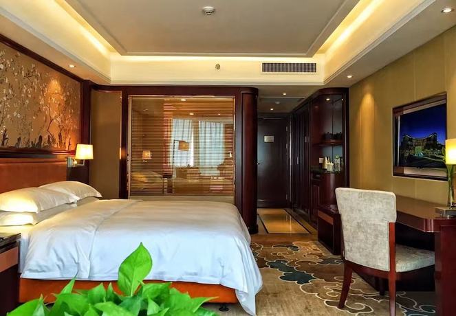 Imagen de la habitación del Hotel Jinling Mingdu Changzhou. Foto 16