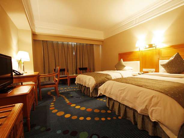 Imagen de la habitación del Hotel Jinling Mingdu Changzhou. Foto 17