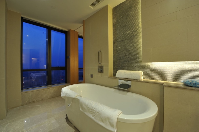 Imagen de la habitación del Hotel Jinling Nanjing. Foto 3