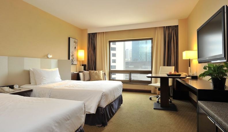 Imagen de la habitación del Hotel Jinling Nanjing. Foto 4