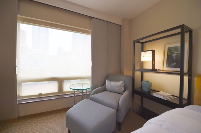 Imagen de la habitación del Hotel Jinling Nanjing. Foto 7