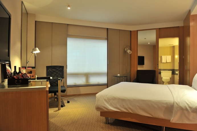 Imagen de la habitación del Hotel Jinling Nanjing. Foto 12