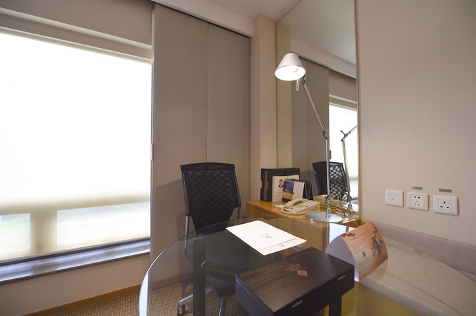 Imagen de la habitación del Hotel Jinling Nanjing. Foto 13