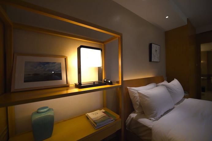 Imagen de la habitación del Hotel Jinling Nanjing. Foto 14