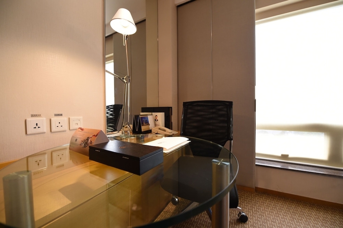 Imagen de la habitación del Hotel Jinling Nanjing. Foto 15