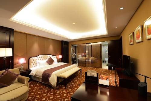 Imagen de la habitación del Hotel Jinling New Town Nanjing. Foto 1