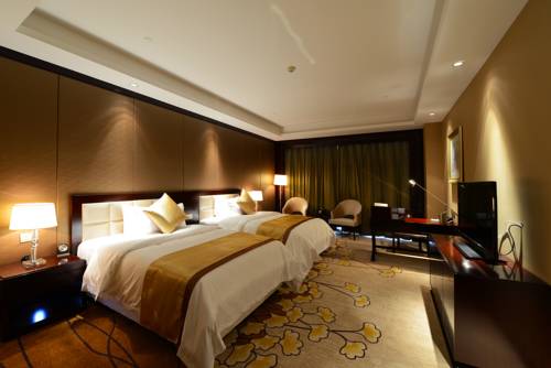 Imagen de la habitación del Hotel Jinling New Town Nanjing. Foto 3
