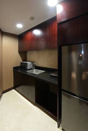 Imagen de la habitación del Hotel Jinling New Town Nanjing. Foto 4