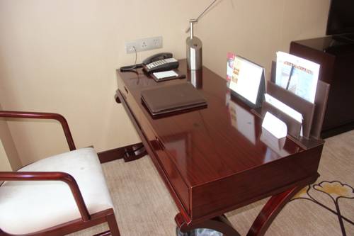 Imagen de la habitación del Hotel Jinling New Town Nanjing. Foto 6