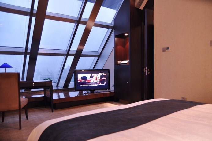 Imagen de la habitación del Hotel Jinling Purple Mountain Shanghai. Foto 11