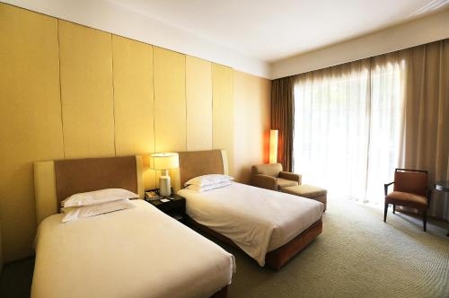 Imagen de la habitación del Hotel Jinling Resort Nanjing. Foto 4