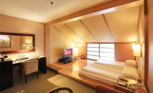 Imagen de la habitación del Hotel Jinling Resort Nanjing. Foto 5