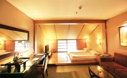 Imagen de la habitación del Hotel Jinling Resort Nanjing. Foto 6