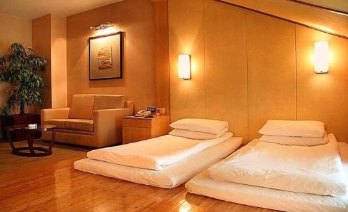 Imagen de la habitación del Hotel Jinling Resort Nanjing. Foto 7