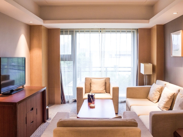Imagen de la habitación del Hotel Jinling Riverside Nanjing. Foto 2