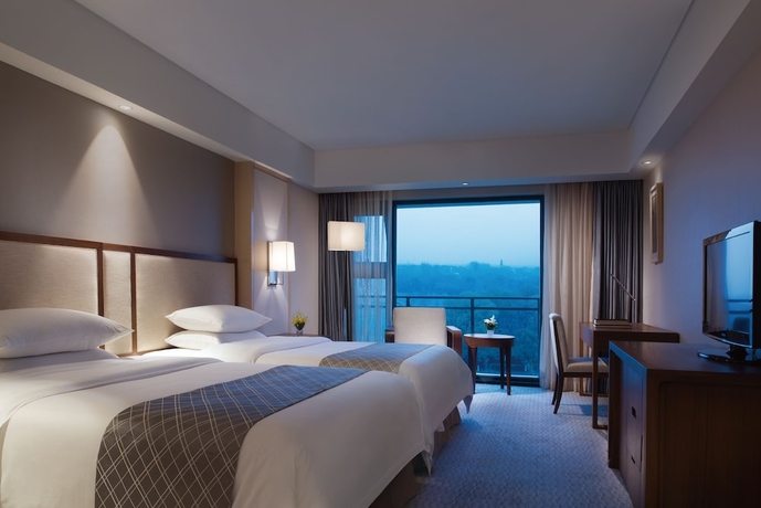 Imagen de la habitación del Hotel Jinling Riverside Nanjing. Foto 7