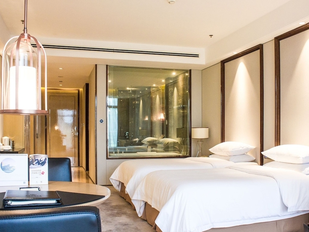 Imagen de la habitación del Hotel Jinling Riverside Nanjing. Foto 8