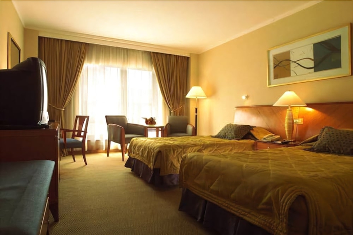 Imagen de la habitación del Hotel Jinling Riverside Nanjing. Foto 11