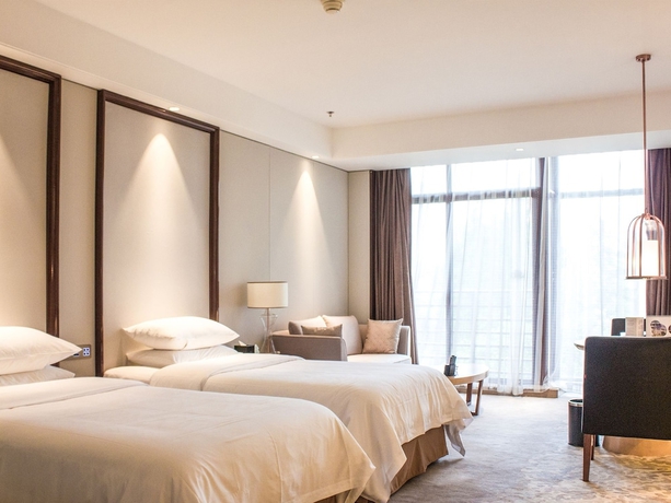 Imagen de la habitación del Hotel Jinling Riverside Nanjing. Foto 14