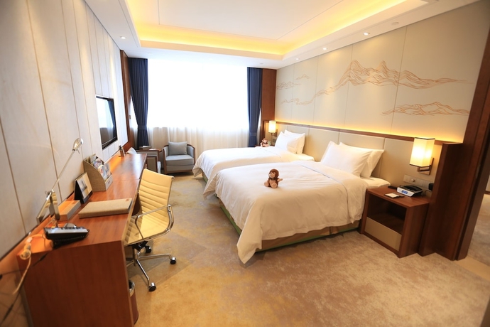 Imagen de la habitación del Hotel Jinling Shihu Garden Suzhou. Foto 10
