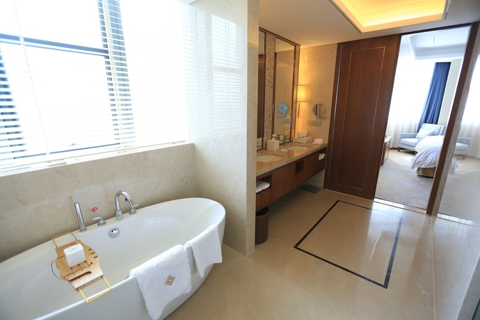 Imagen de la habitación del Hotel Jinling Shihu Garden Suzhou. Foto 18