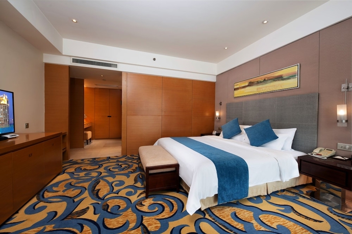 Imagen de la habitación del Hotel Jinling Wuxi. Foto 3
