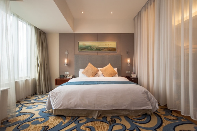 Imagen de la habitación del Hotel Jinling Wuxi. Foto 4